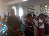 Members of St. John of<br> Shanghai parish in Les Cayes.